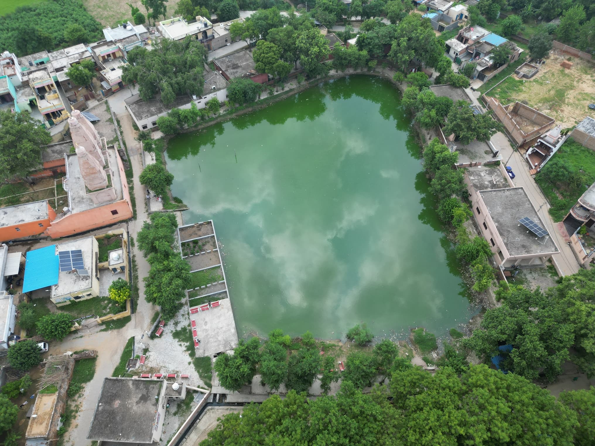 Aerial view of Maujabad pond and the village surrounding it