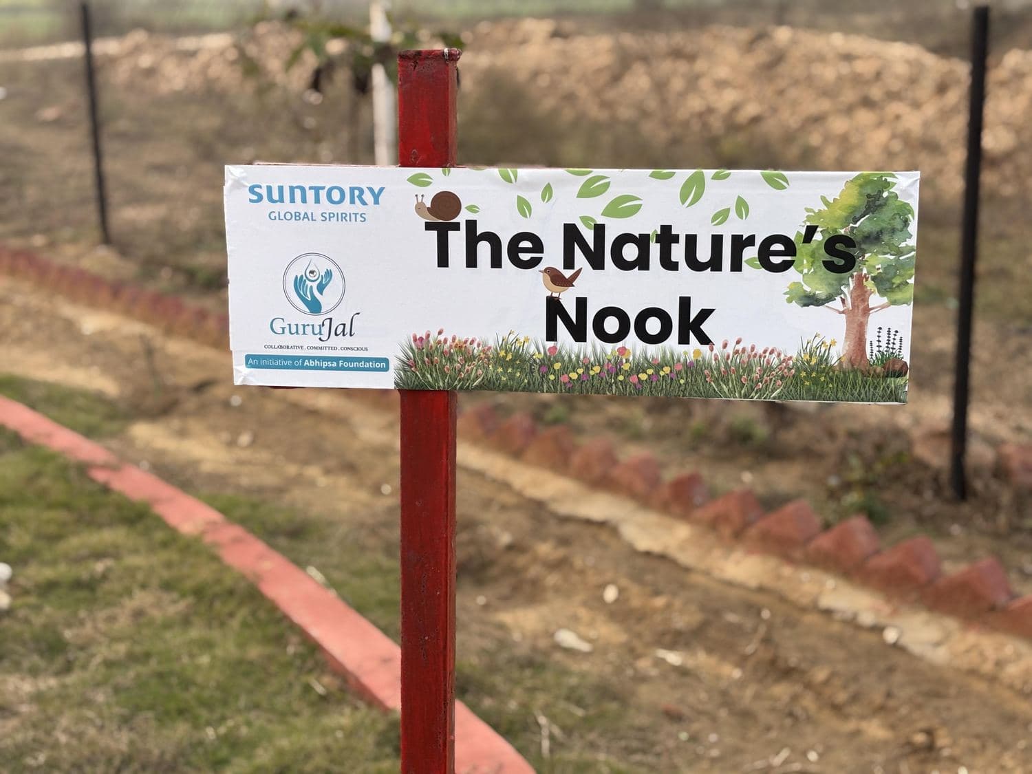 'The Nature's Nook' signage in the landscaped green zone